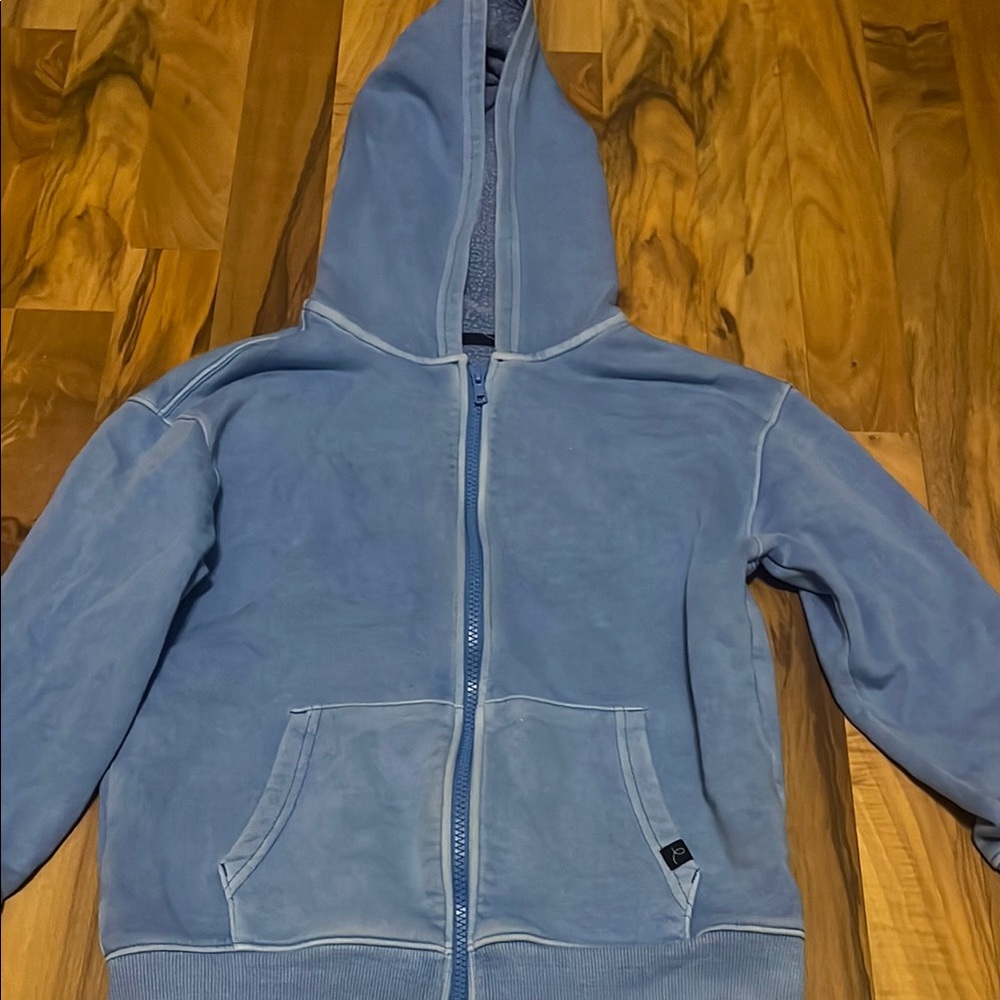 Light Blue Zip-Up Hoodie with Attached Hood and Soft Fabric